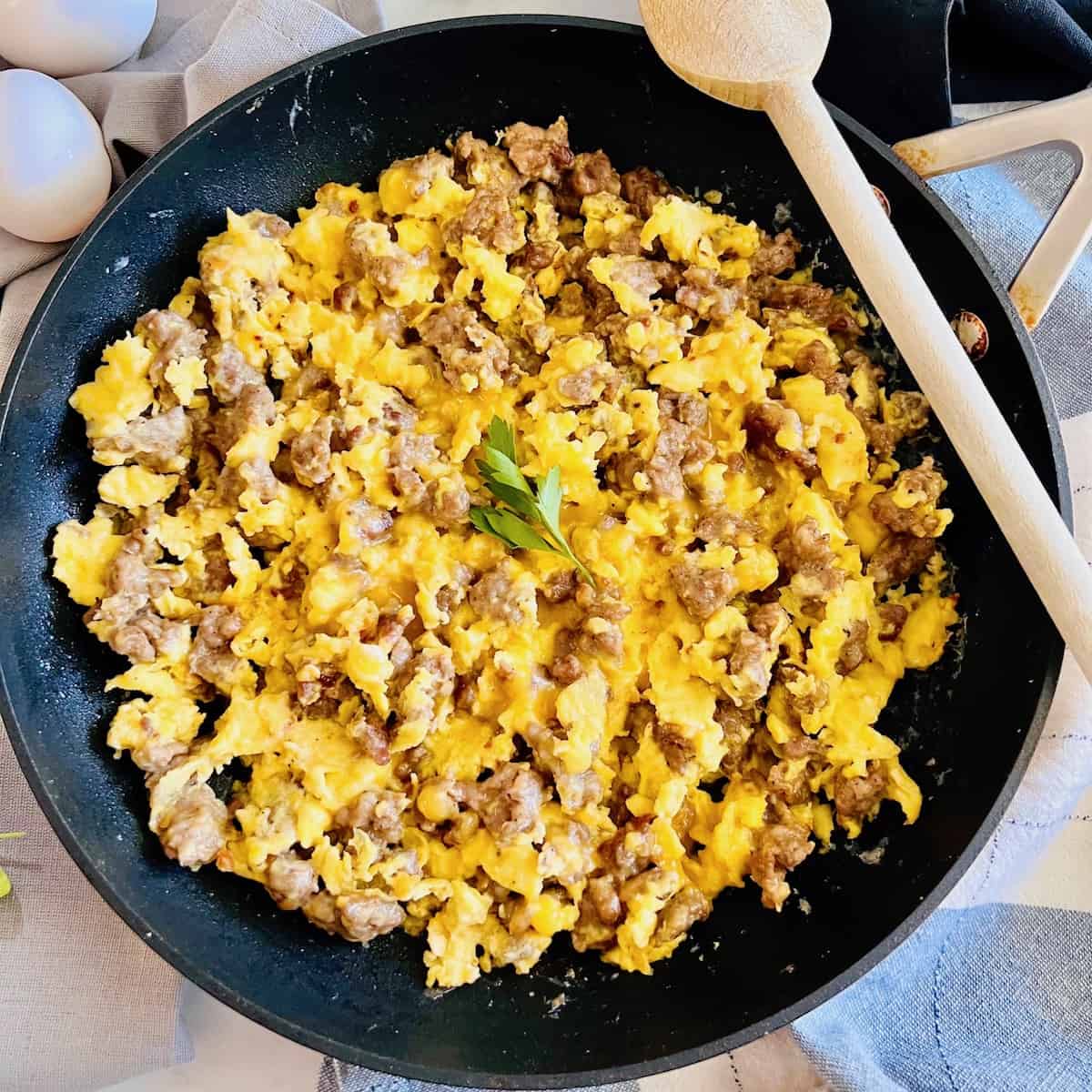 Secrets to Moist Scrambled Eggs: Sausage, Tomato, & Gruyere